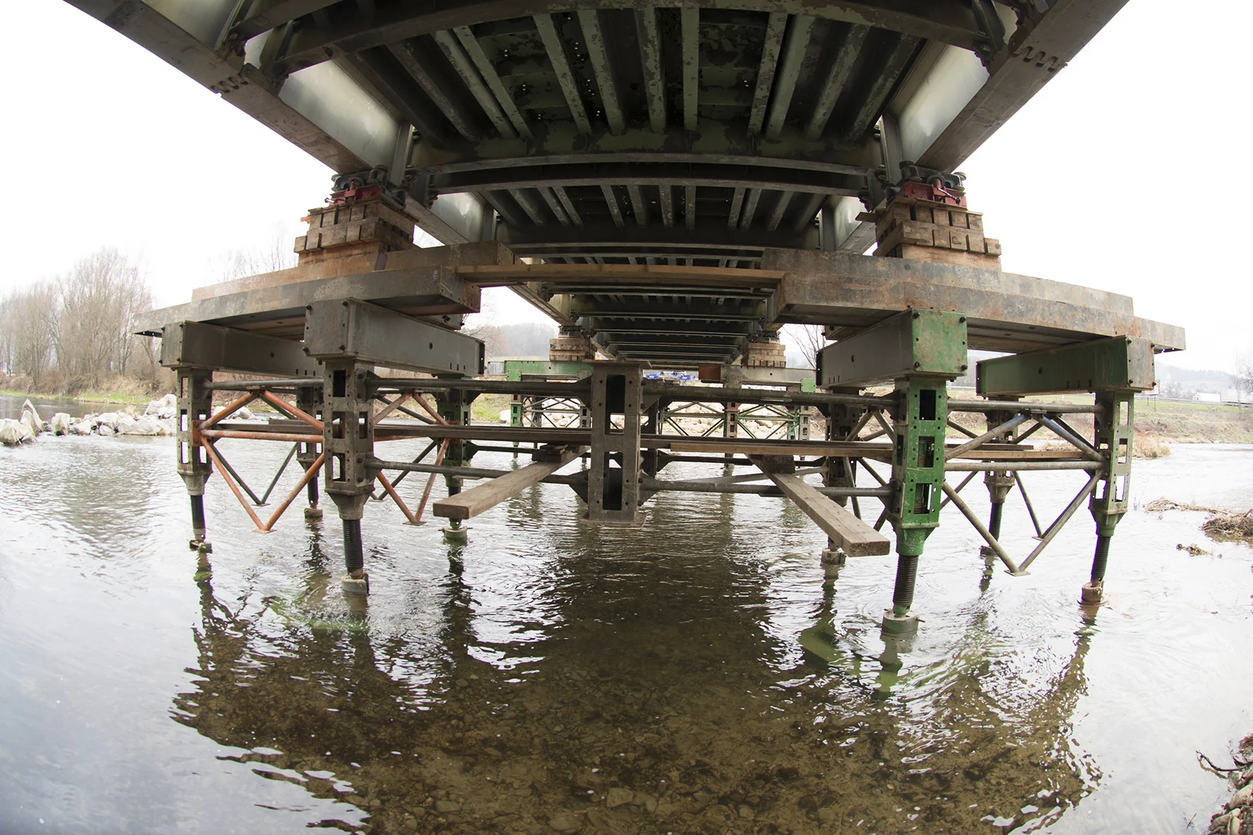 Temporary bridge support over water